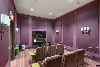 Home movie theater with oversized plush chairs